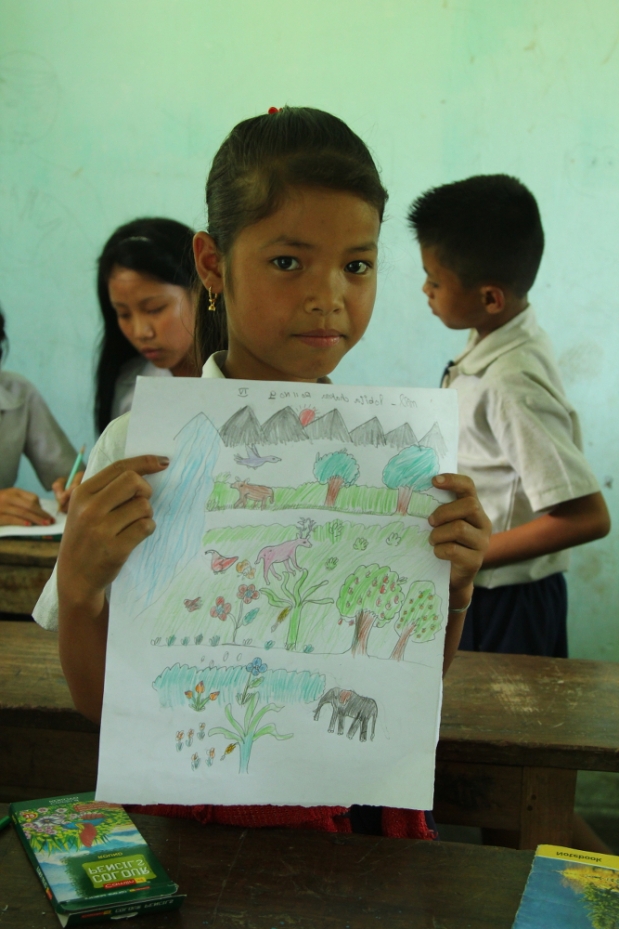 One of the students with her painting